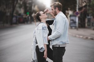 Couple hugging in the street